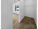 Walk-in closet with double hanging rods and shelving at 521 E Cheyenne Rd, San Tan Valley, AZ 85143