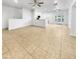 Open living space with kitchen island and access to patio at 521 E Cheyenne Rd, San Tan Valley, AZ 85143