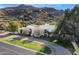 Luxury estate home with mountain views and a large circular driveway at 5301 E Roadrunner Rd, Paradise Valley, AZ 85253