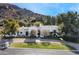 Stunning aerial view of a luxurious estate home nestled against a mountain backdrop at 5301 E Roadrunner Rd, Paradise Valley, AZ 85253