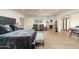 Elegant bedroom featuring a fireplace, hardwood floors, and two comfy armchairs at 5301 E Roadrunner Rd, Paradise Valley, AZ 85253