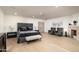 Serene bedroom with fireplace, hardwood floors, and ample space at 5301 E Roadrunner Rd, Paradise Valley, AZ 85253