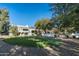 Expansive circular lawn with gravel border; elegant and low maintenance at 5301 E Roadrunner Rd, Paradise Valley, AZ 85253