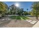 Expansive circular lawn with stone pathway; modern and stylish at 5301 E Roadrunner Rd, Paradise Valley, AZ 85253