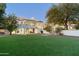 Backyard features artificial turf and a beautiful home exterior at 5301 E Roadrunner Rd, Paradise Valley, AZ 85253