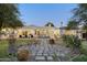 Stunning home exterior featuring a large backyard, pool, and mountain views at 5301 E Roadrunner Rd, Paradise Valley, AZ 85253