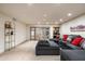 Gathering room with sectional sofa, a wet bar, and light wood floors at 5301 E Roadrunner Rd, Paradise Valley, AZ 85253