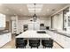 Bright kitchen featuring a large island and skylights at 5301 E Roadrunner Rd, Paradise Valley, AZ 85253