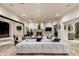 Relaxing living room with a fireplace and access to the backyard at 5301 E Roadrunner Rd, Paradise Valley, AZ 85253