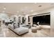 Spacious living area opening to a backyard oasis with a pool at 5301 E Roadrunner Rd, Paradise Valley, AZ 85253