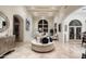 Open concept living area with a grand piano and ample natural light at 5301 E Roadrunner Rd, Paradise Valley, AZ 85253