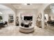 Elegant living room with a comfortable seating arrangement and views to other rooms at 5301 E Roadrunner Rd, Paradise Valley, AZ 85253
