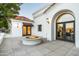 Outdoor patio with fire pit and French doors leading inside at 5301 E Roadrunner Rd, Paradise Valley, AZ 85253
