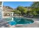 Inviting pool and spa with a covered patio and mountain views at 5301 E Roadrunner Rd, Paradise Valley, AZ 85253