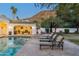Expansive pool and spa with a covered patio, and mountain views at 5301 E Roadrunner Rd, Paradise Valley, AZ 85253