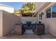 Cozy patio furniture on a stone patio for relaxing at 6350 N 78Th St # 256, Scottsdale, AZ 85250