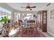 Charming dining room featuring a wood table and hutch at 910 W San Mateo Ct, Gilbert, AZ 85233