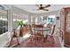 Bright dining area with bay window and wooden furnishings at 910 W San Mateo Ct, Gilbert, AZ 85233