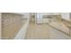 Kitchen with granite counters, white cabinets, and appliances at 14953 W Walking Stick Way, Surprise, AZ 85374