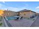 This home boasts a beautiful pool and patio perfect for outdoor entertaining at 17322 W Wandering Creek Rd, Goodyear, AZ 85338