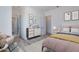 Bright bedroom with a comfortable bed and stylish decor at 24108 N 100Th Ln, Peoria, AZ 85383