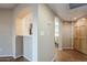 Entryway with view into kitchen and wood flooring at 7777 E 2Nd St # 111, Scottsdale, AZ 85251