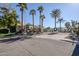 gated community entrance with palm trees at 7777 E 2Nd St # 111, Scottsdale, AZ 85251