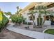 Landscaped walkway leading to the building with lush greenery at 7777 E 2Nd St # 111, Scottsdale, AZ 85251