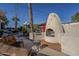 Relaxing outdoor patio with fireplace and grill at 7777 E 2Nd St # 111, Scottsdale, AZ 85251