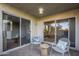 Spacious patio with seating area and sliding glass doors at 7777 E 2Nd St # 111, Scottsdale, AZ 85251