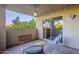 Private patio with seating area and view of trees at 7777 E 2Nd St # 111, Scottsdale, AZ 85251