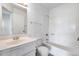 Clean bathroom with a tub, shower, and vanity at 14300 W Bell Rd # 65, Surprise, AZ 85374