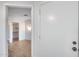 Simple bedroom with wood-look floors and access to closets and bath at 14300 W Bell Rd # 65, Surprise, AZ 85374