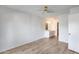 Bedroom with ceiling fan and en-suite bathroom at 14300 W Bell Rd # 65, Surprise, AZ 85374