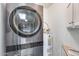 Stackable washer and dryer in laundry room at 14300 W Bell Rd # 65, Surprise, AZ 85374