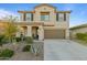 Two story house with landscaped yard and attached garage at 29840 N 115Th Gln, Peoria, AZ 85383