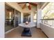 Private balcony with patio table and ceiling fan at 33550 N Dove Lakes Dr # 2026, Cave Creek, AZ 85331