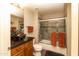 Bathroom with glass shower, granite countertop, and modern vanity at 33550 N Dove Lakes Dr # 2026, Cave Creek, AZ 85331