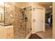 Spa-like bathroom with a large walk-in shower and tile surround at 33550 N Dove Lakes Dr # 2026, Cave Creek, AZ 85331