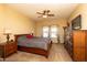 Comfortable bedroom with ceiling fan and ample closet space at 33550 N Dove Lakes Dr # 2026, Cave Creek, AZ 85331