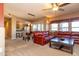 Open dining area with kitchen view and leather seating at 33550 N Dove Lakes Dr # 2026, Cave Creek, AZ 85331