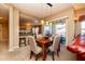 Dining area with table and chairs, adjacent to kitchen at 33550 N Dove Lakes Dr # 2026, Cave Creek, AZ 85331