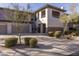 Two-story condo building with attached garage and landscaping at 33550 N Dove Lakes Dr # 2026, Cave Creek, AZ 85331