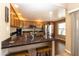 Kitchen with granite countertops, island, and wood cabinets at 33550 N Dove Lakes Dr # 2026, Cave Creek, AZ 85331