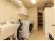Laundry room with washer, dryer, and utility sink at 33550 N Dove Lakes Dr # 2026, Cave Creek, AZ 85331