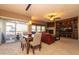 Living room with fireplace, built-ins, and leather sofa at 33550 N Dove Lakes Dr # 2026, Cave Creek, AZ 85331