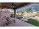 Inviting backyard oasis with a sparkling pool and patio seating at 3829 S Harlan --, Mesa, AZ 85212