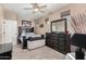 Bedroom with a queen-size bed and dresser at 3829 S Harlan --, Mesa, AZ 85212