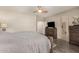 Comfortable bedroom with ensuite bathroom and large TV at 3829 S Harlan --, Mesa, AZ 85212
