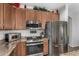 Eat-in kitchen with stainless steel appliances and granite countertops at 3829 S Harlan --, Mesa, AZ 85212